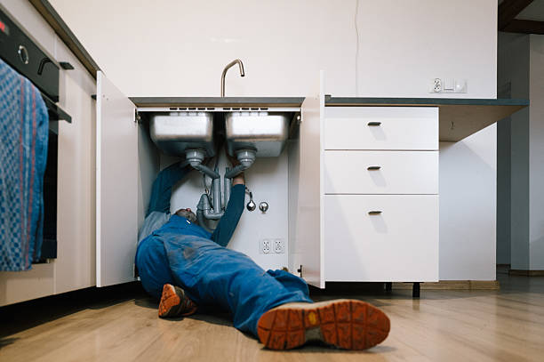 Professional Plumbing technician working in Milroy, IN